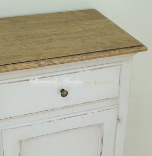 Kitchen or living room cupboard in solid wood with very antique white finish and solid oak top
